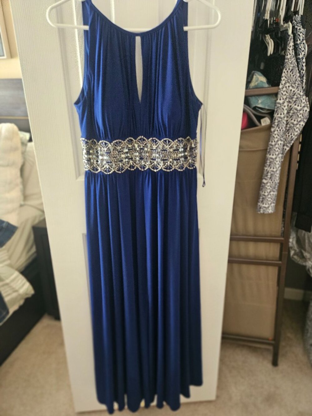 Vibrant blue dinner dress with silver band